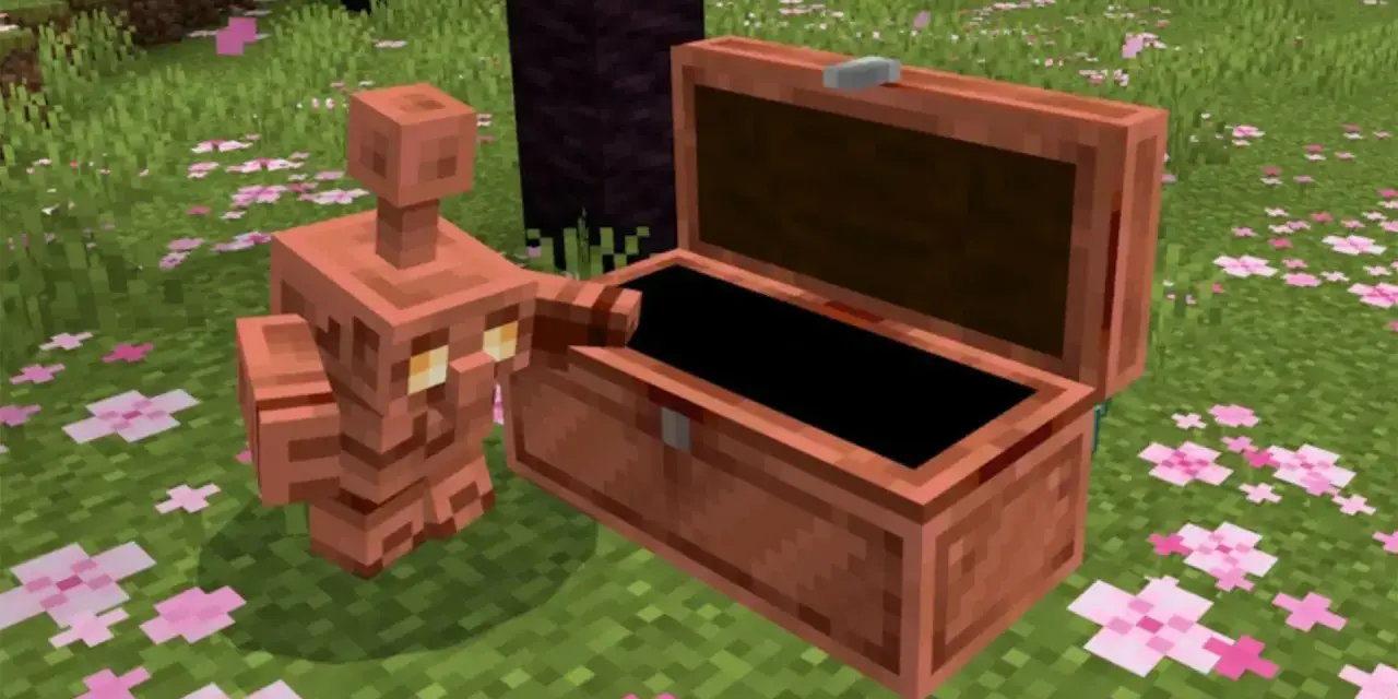 Un golem de cobre, con su cuerpo brillante, se asoma a un cofre abierto en un campo cubierto de flores rosadas.