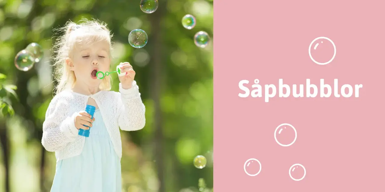 Liten flicka blåser stora såpbubblor i en grönskande trädgård. Kanske hon följer ett recept för extra stora bubblor!