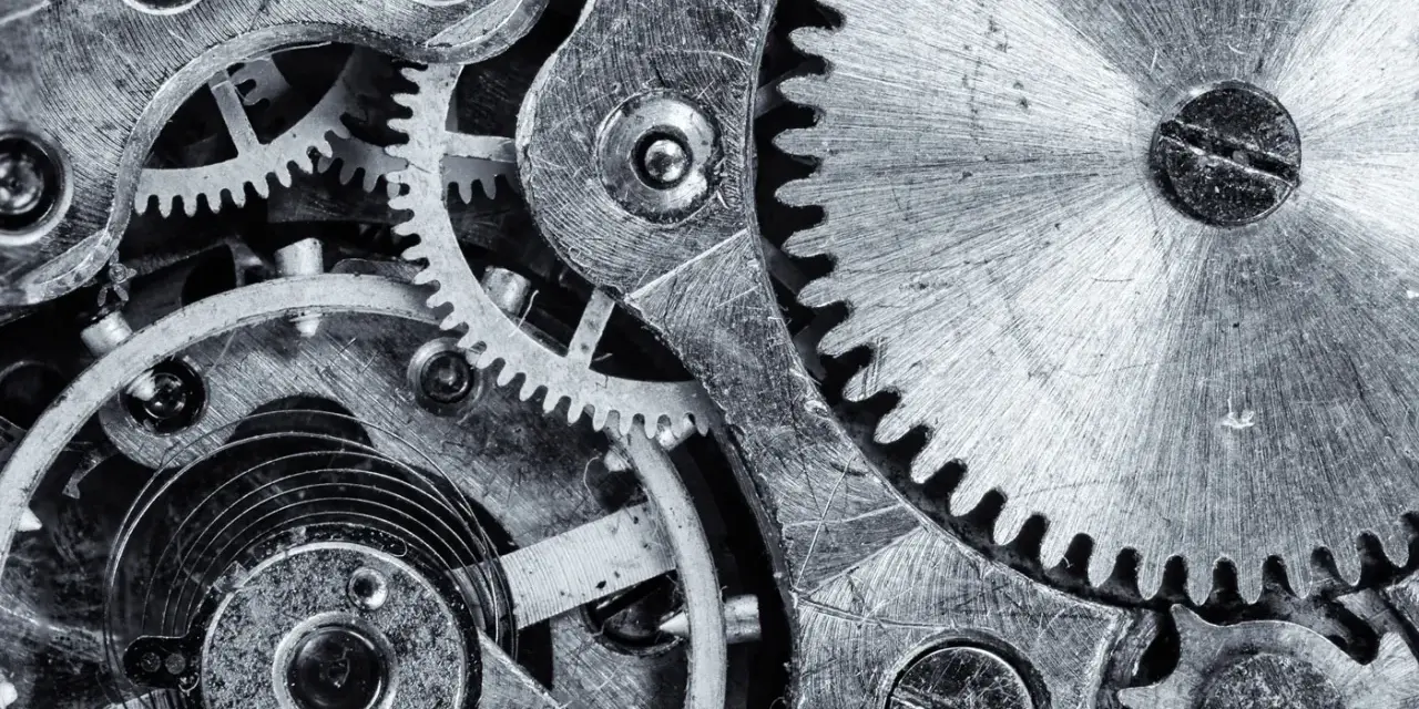 Złożony mechanizm zegarka, zębatki i sprężyny tworzą skomplikowany mechanizm rozproszonego ja, gdzie każdy element ma swoje miejsce.