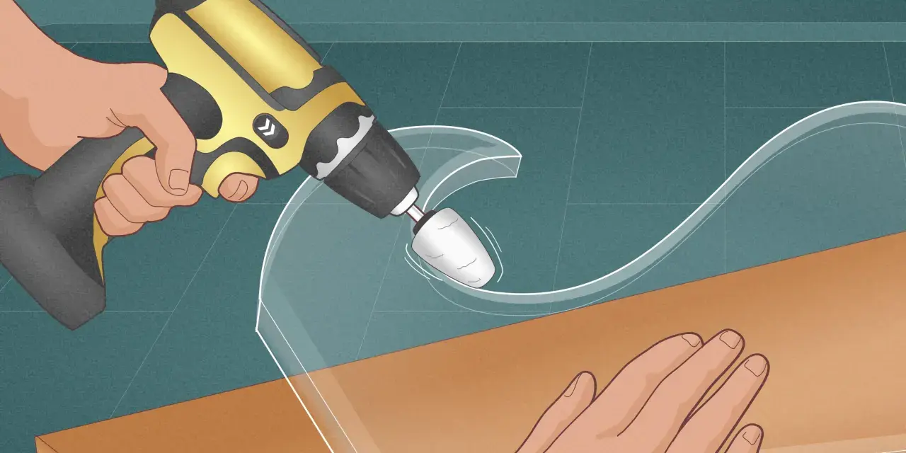 Using a rotary tool to carefully shape a piece of plastic, demonstrating how to cut plastic glass for a custom project.