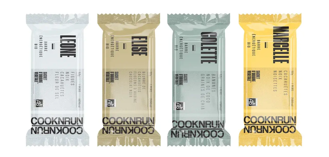 Quatre barres énergétiques bio Cooknrun : Léone (figue, noix, cacahuète, fleur de sel), Élise (chocolat noir, avoine, cacahuète), Colette (banane, noix de coco, chia), Marcelle (cacahuète, noisette). Un parcours nutritionnel savoureux.