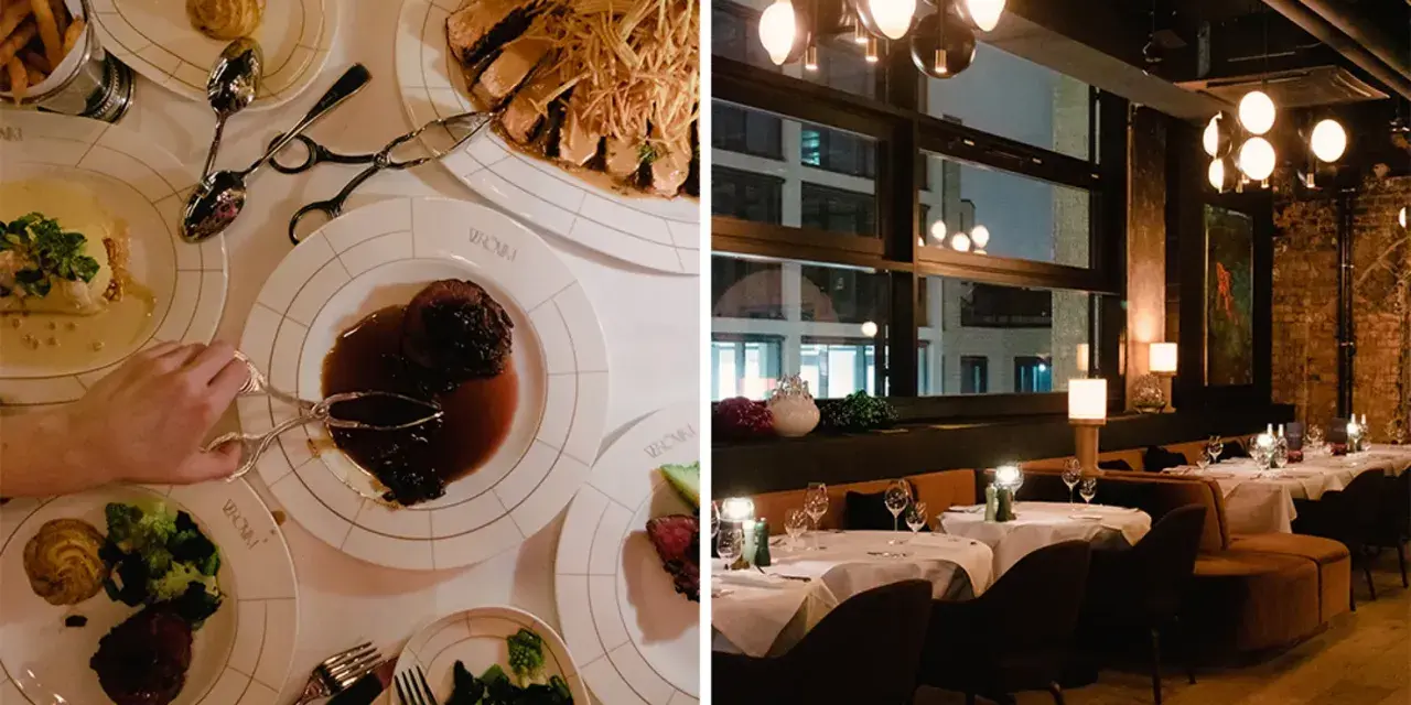 Essen gehen in Berlin: Teller mit Fleisch, Beilagen und eine Hand, die mit einer Zange zugreift. Im Hintergrund ein stilvolles Restaurant mit Tischen und Lichtern.
