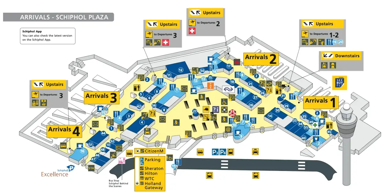 Plan lotniska w Amsterdamie Schiphol Plaza z oznaczeniami przylotów, odlotów i udogodnień.