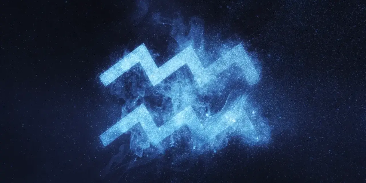 Błękitny symbol Wodnika, znaku zodiaku 6 lutego, lśni na tle nocnego nieba pełnego gwiazd.