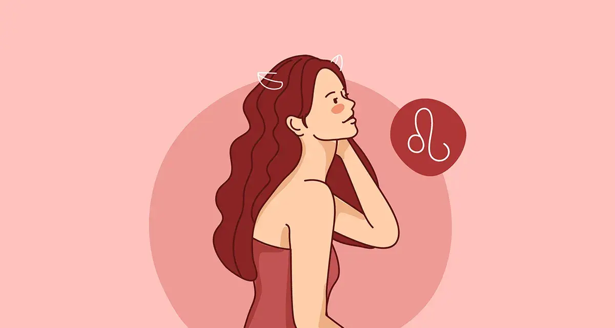 Kobieta z długimi włosami i symbolem Lwa. Jej postawa sugeruje pewność siebie, typową dla lew znak zodiaku charakterystyka.