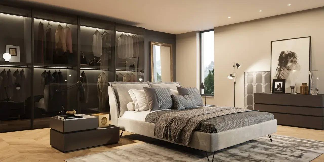 Camera da letto moderna con comò scuro, specchio dorato e un armadio a vista. Ideale per ispirazione su cosa mettere sul comò della camera da letto moderna.