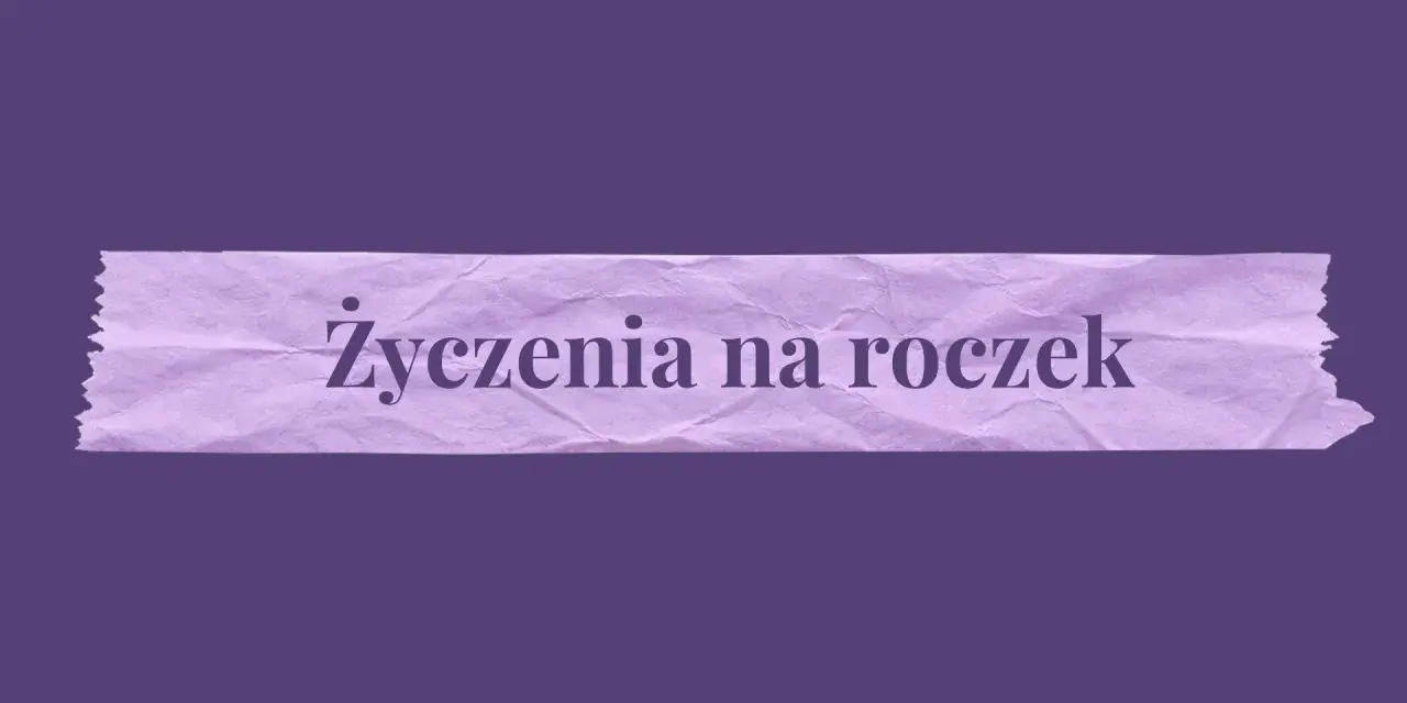 Fioletowa taśma z napisem "Życzenia na roczek". Idealna do ozdobienia kartek z życzeniami.