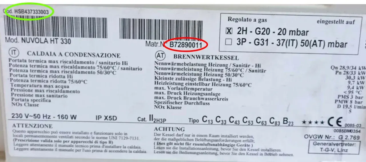 Etichetta caldaia con modello NUVOLA HT 330 e matricola B72890011. Dettagli tecnici e avvertenze di installazione.