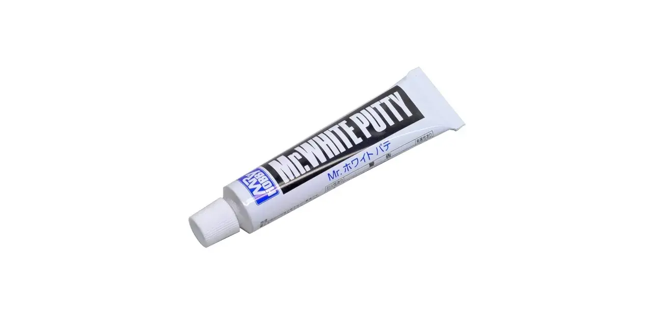 Tubo di stucco bianco "Mr. White Putty" per modellismo, ideale per riempire fessure e imperfezioni.