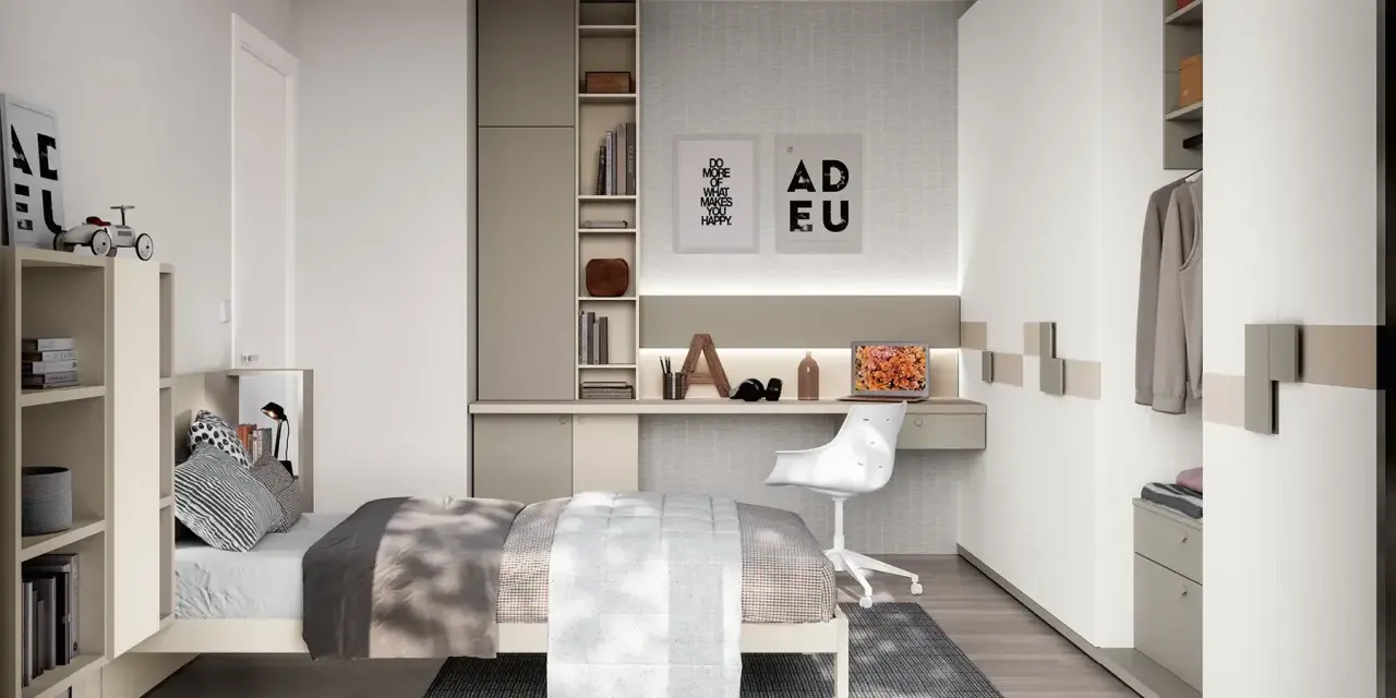 Moderna zona studio ragazzi con letto, scrivania, libreria e armadio.