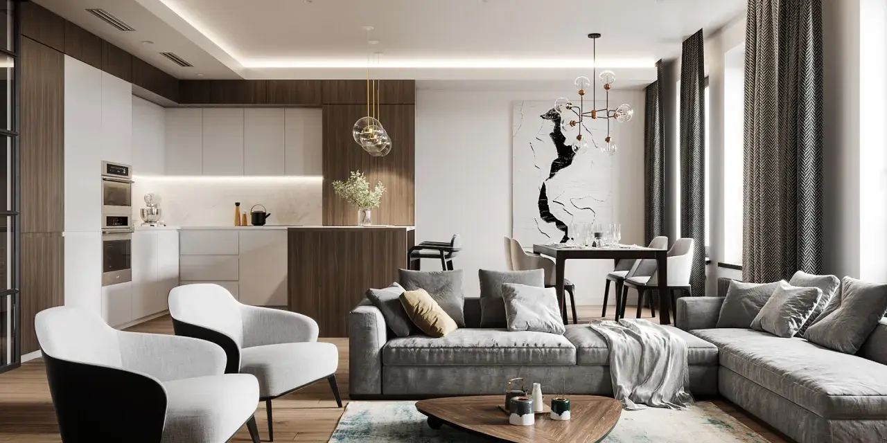 Soggiorno e cucina open space con divano angolare grigio, poltrone bianche, tavolino in legno e un tocco di **arredamento contemporaneo chic**.