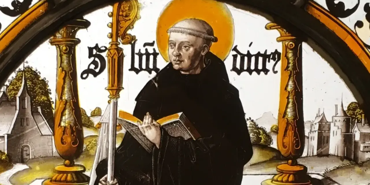 Stained glass depicting St. Benedict the Abbot, holding a book and staff, with a monastery in the background.