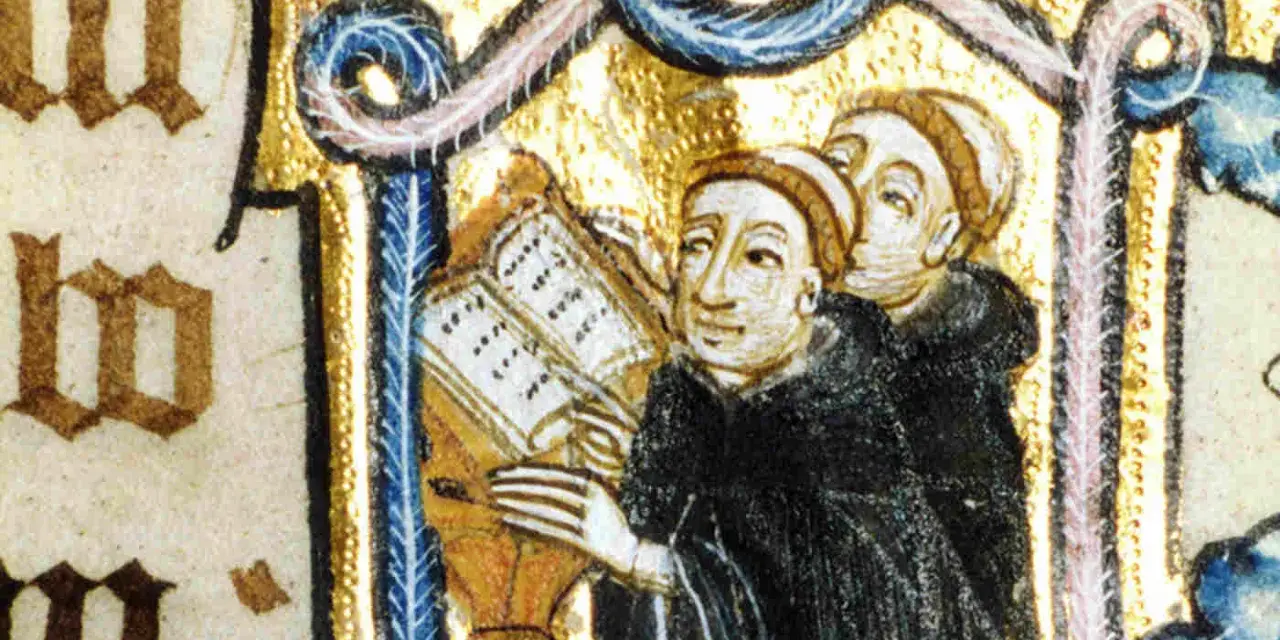 Illuminated manuscript shows Benedictine monks studying a book, illustrating how Benedictine monks spent their time in prayer and learning.