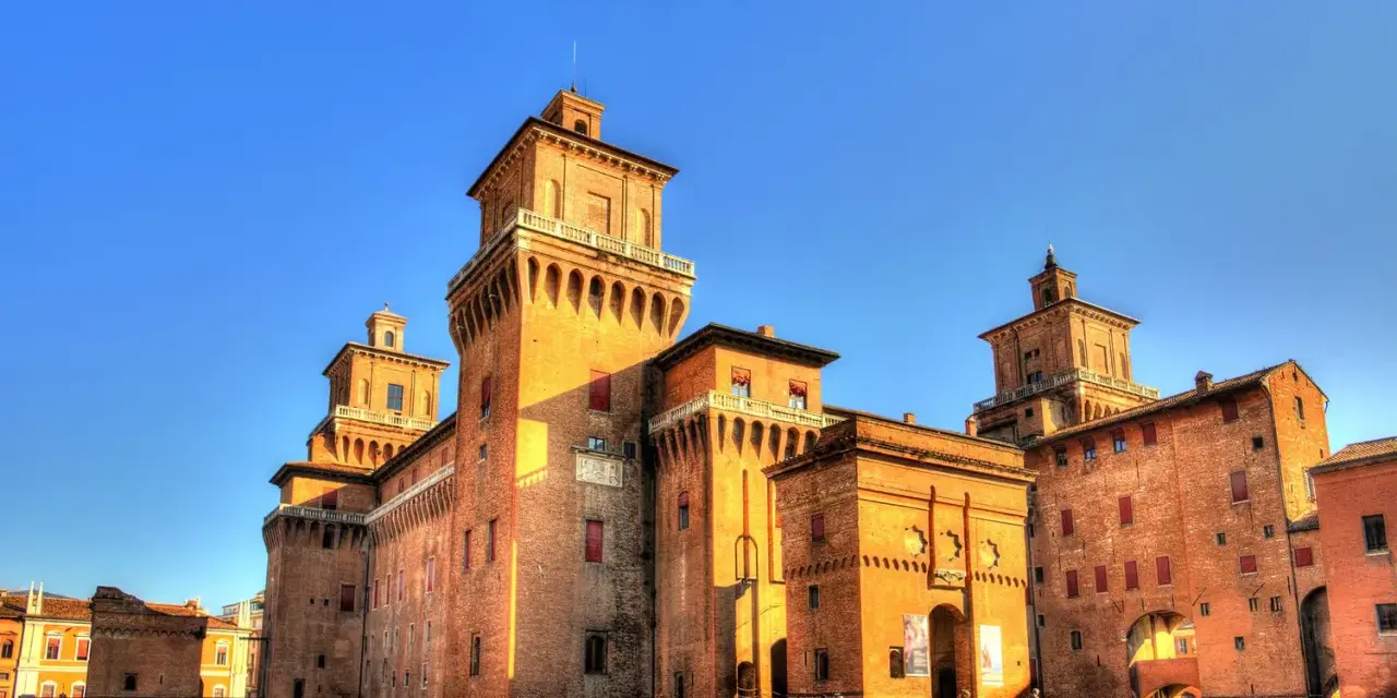 Castello Estense in Ferrara, a stunning brick fortress, is one of the best day trips from Bologna.