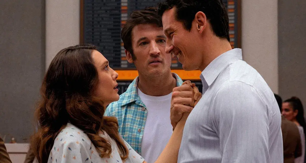 Miles Teller in un film, con Elizabeth Olsen e un altro uomo che si tengono per mano.