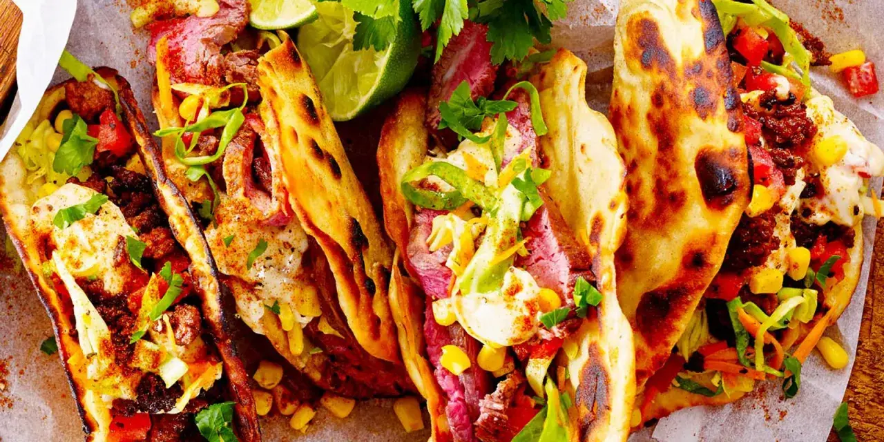 Saftige Rindfleisch-Tacos mit Mais, Salat und Limette. Perfekt für deine nächsten Taco Rezepte!