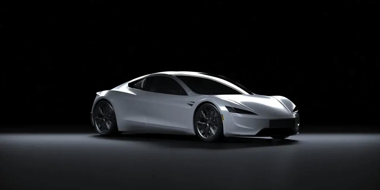 Srebrny Tesla Roadster na czarnym tle. Zastanawiasz się, ile kosztuje Tesla?