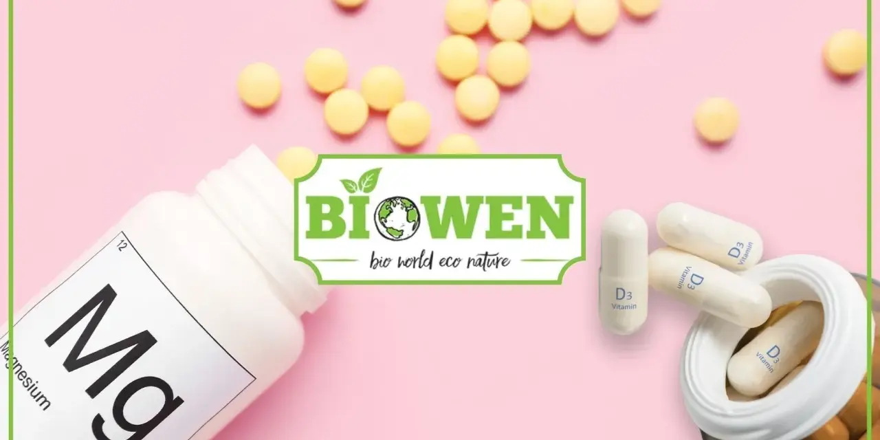 Biała butelka z magnezem, kapsułki z witaminą D3 i żółte tabletki. Logo "Biowen" sugeruje naturalne suplementy, być może zawierające kwas orotowy.