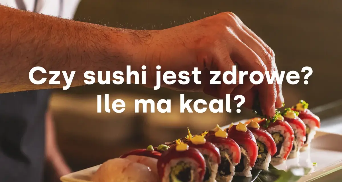 Dłoń dekoruje sushi, które ma wiele zdrowotnych właściwości. Czy sushi jest zdrowe i ile ma kcal?