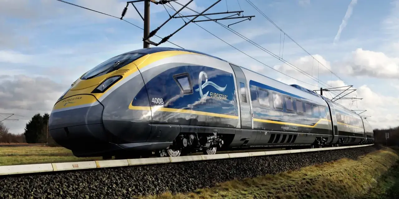 The Eurostar train, number 4008, speeds along the tracks, ready for its journey from Rotterdam to Paris.