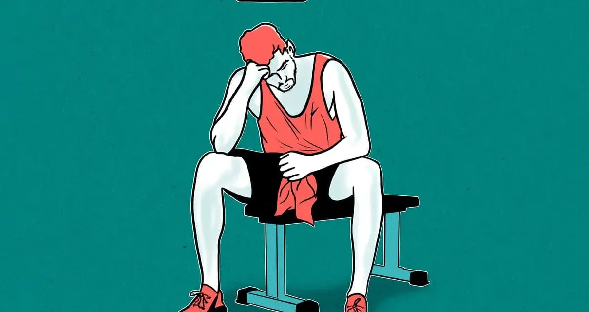 Homme épuisé, assis sur un banc, avec une batterie faible au-dessus de sa tête, symbolisant une carence en protéines.