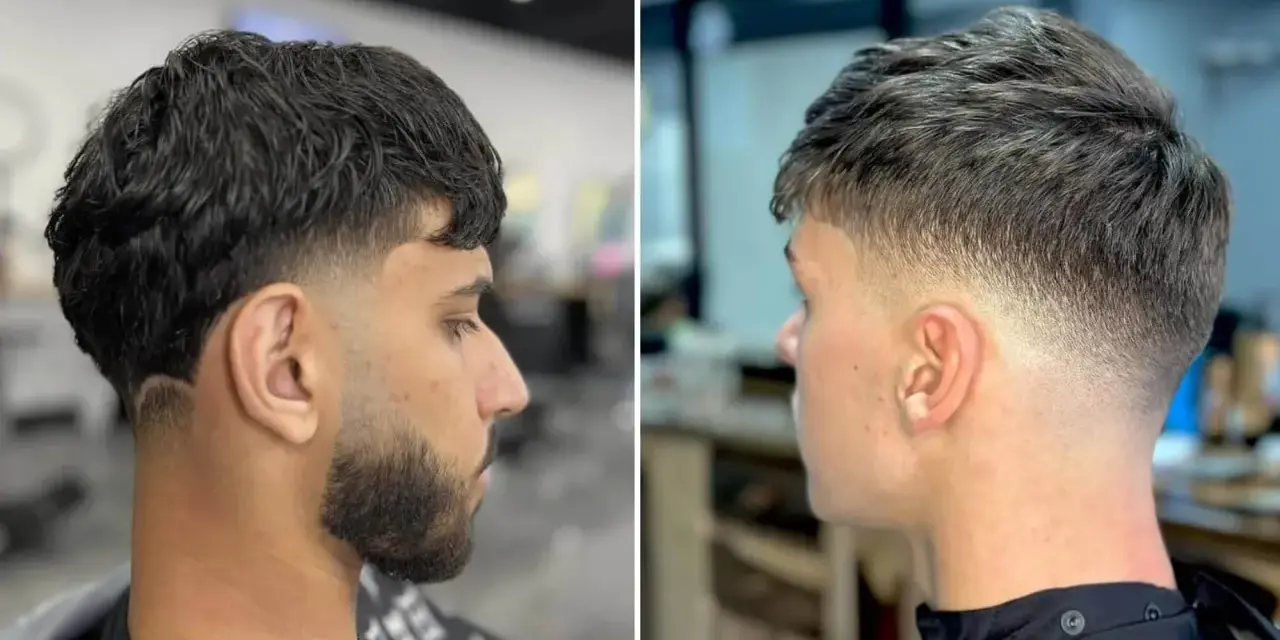 Zwei Männer mit stylischem taper cut. Der linke hat dunkles Haar und Bart, der rechte helleres Haar.