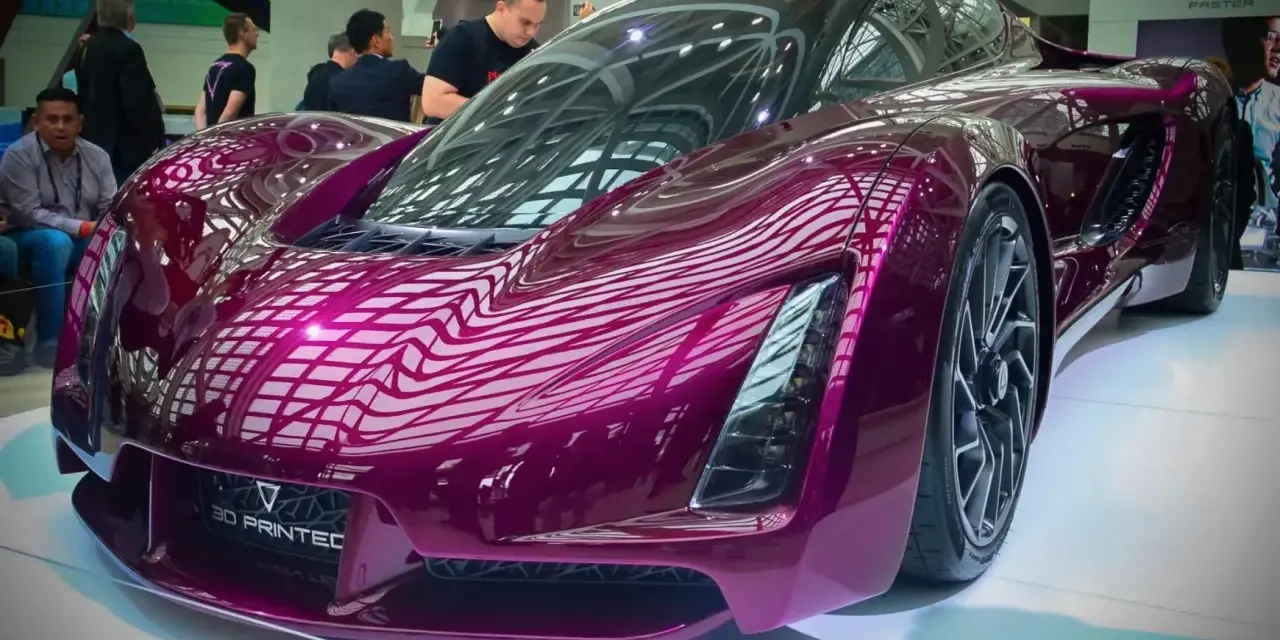 A stunning purple concept car, showcasing the future of automotive 3d printing with its sleek, futuristic design.