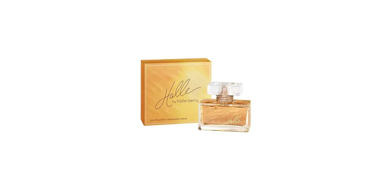 Perfumy Halle Berry: flakon i pudełko z pomarańczowym gradientem.