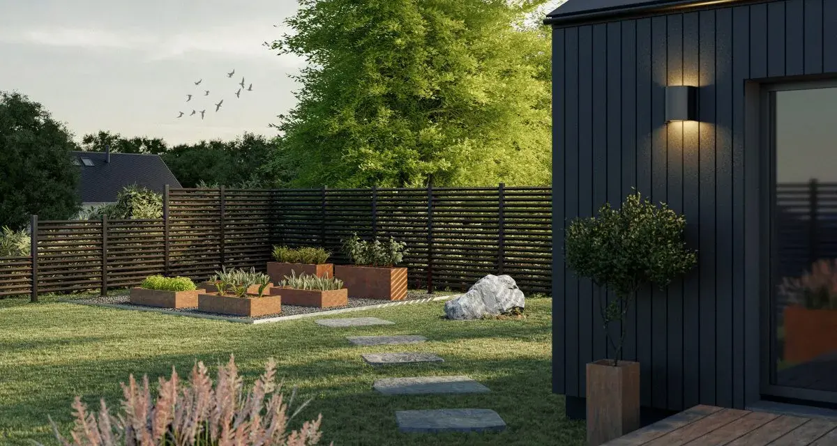 En modern trädgård med odlingslådor och en stenlagd gång leder till framsida hus entre.
