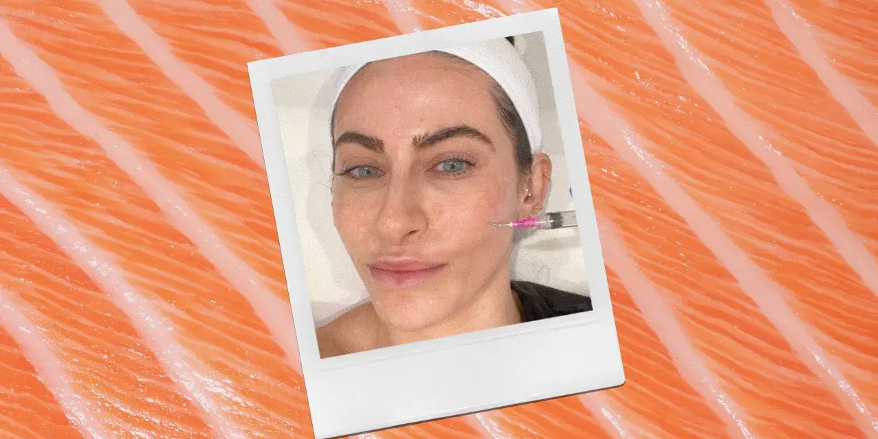 A woman receives a cosmetic injection, possibly part of a salmon sperm facial treatment, against a backdrop of salmon flesh.