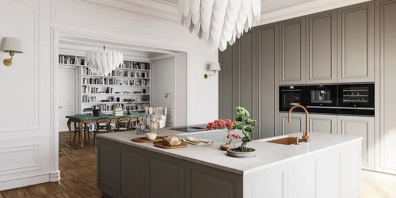 Elegante cucina stile parigino con isola centrale, mobili grigi, elettrodomestici a scomparsa e un'ampia libreria sullo sfondo.