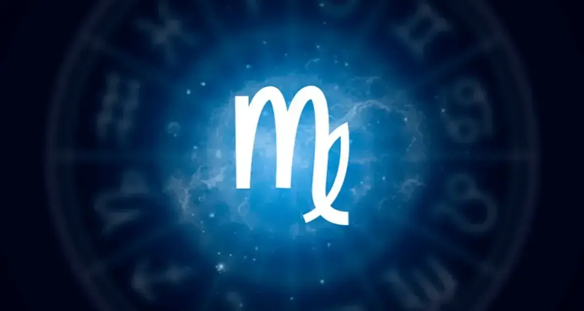 Symbol znaku zodiaku Panna na tle kosmicznym.