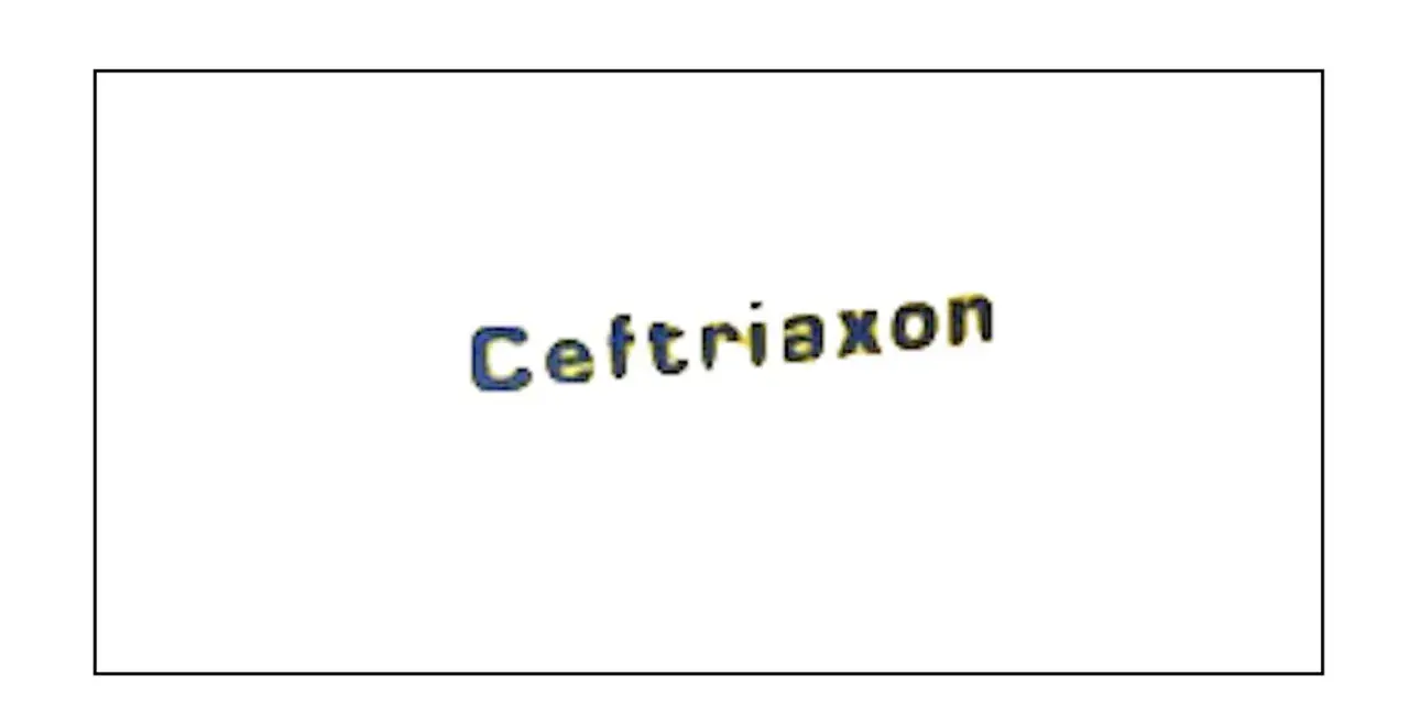 Napis "Ceftriaxon" w kolorze niebiesko-żółtym, lek stosowany w leczeniu infekcji.