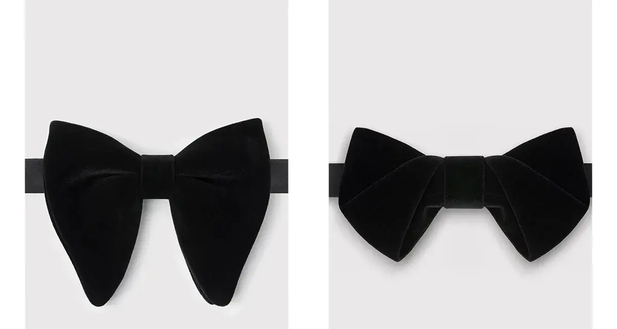 Dwie czarne, aksamitne muchy. Jedna szeroka, druga bardziej klasyczna. Elegancka mucha czy krawat?