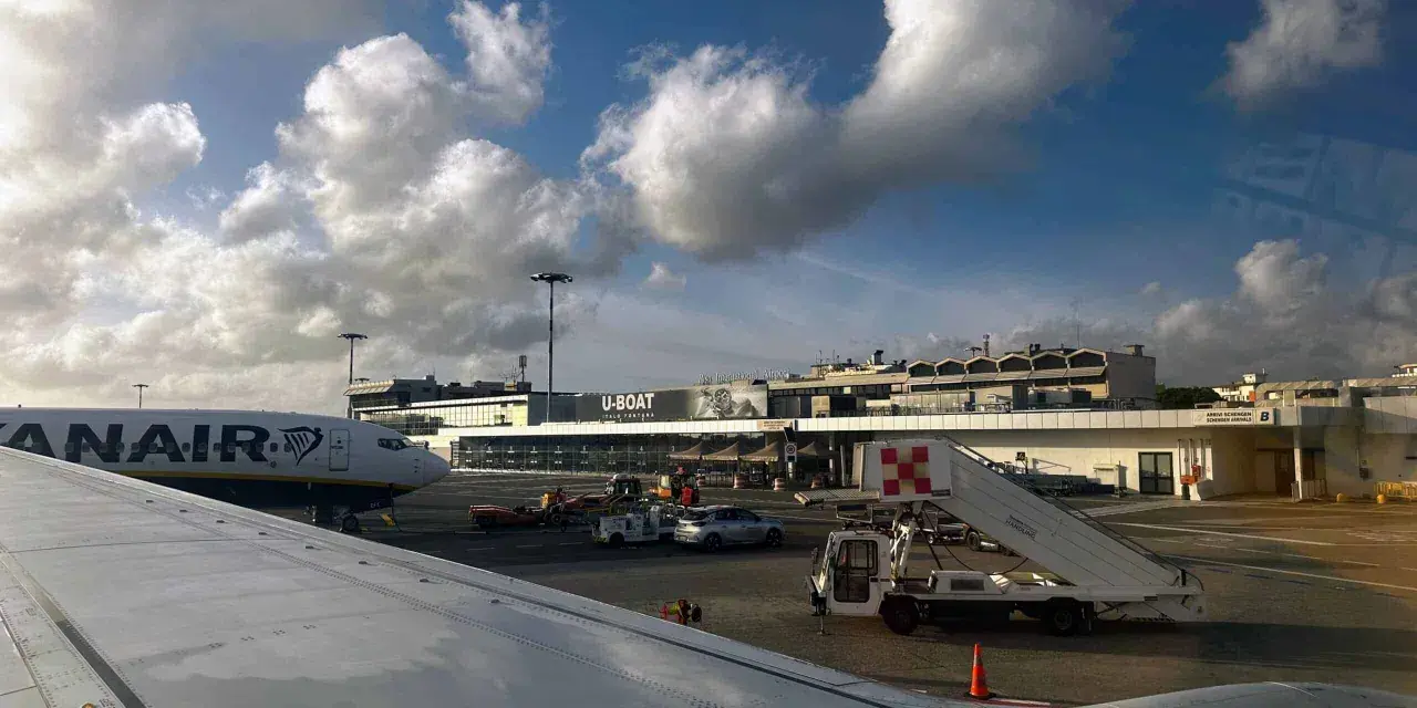 Pisa International Airport, the closest airport to Cinque Terre, with a Ryanair plane on the tarmac.