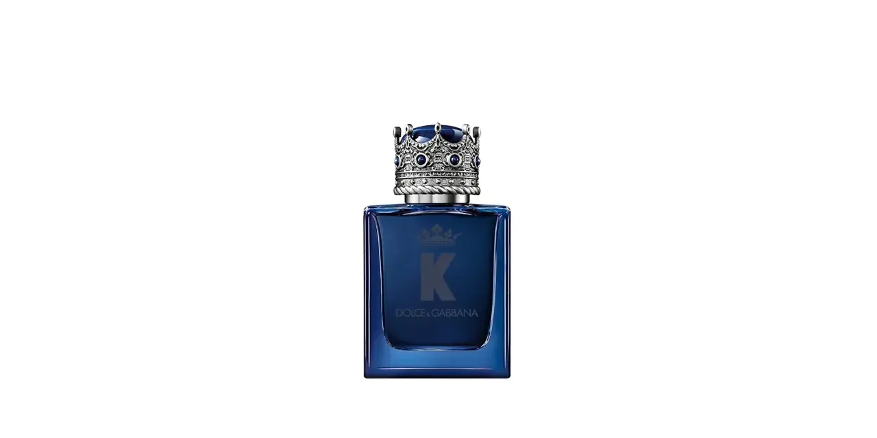 Dunkelblaue Glasflasche mit silberner Krone als Verschluss und "K DOLCE & GABBANA" Schriftzug.