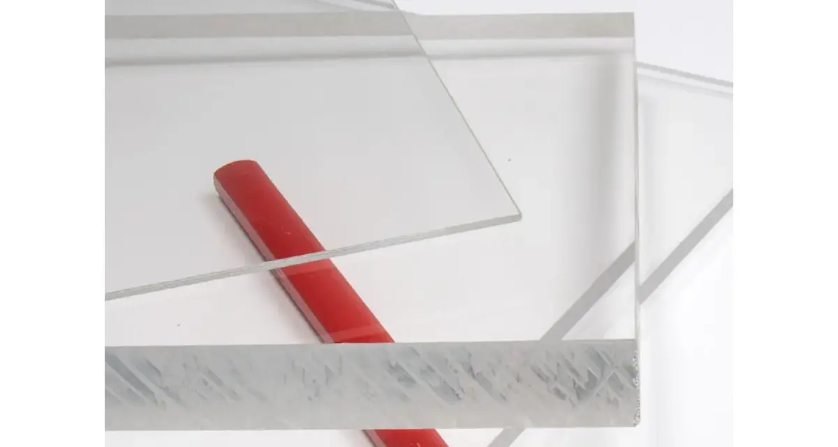 Clear acrylic sheets with a red rod on a white background.