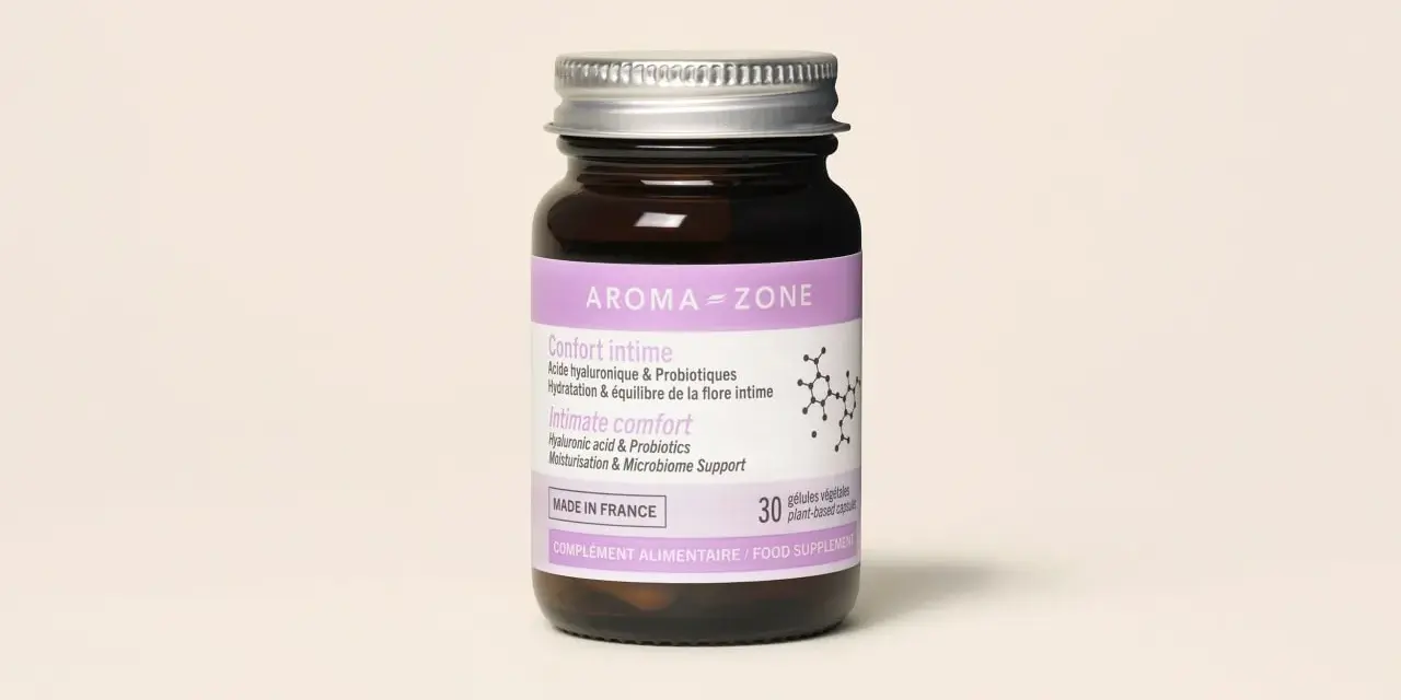 Flacon de compléments alimentaires Aroma-Zone pour le confort intime, contenant acide hyaluronique et probiotiques vaginaux.