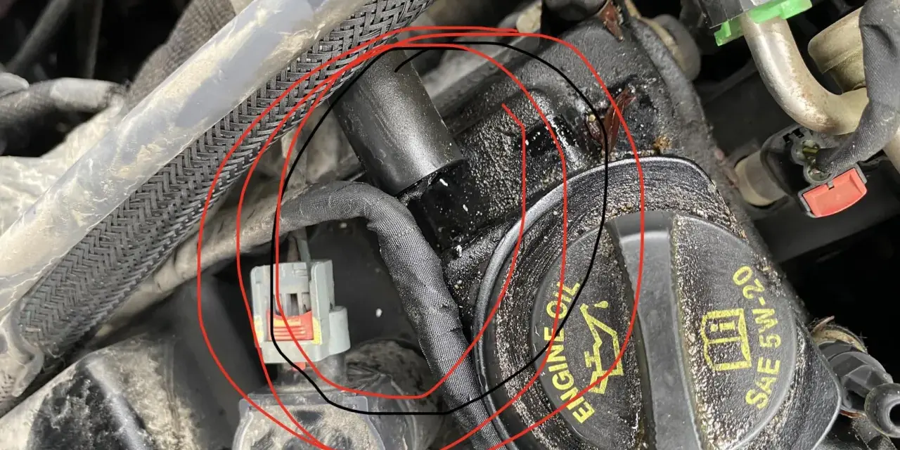 Zaznaczony przewód zapłonowy i wtyczka mogą być przyczyną błędu dtc p0301 volkswagen.