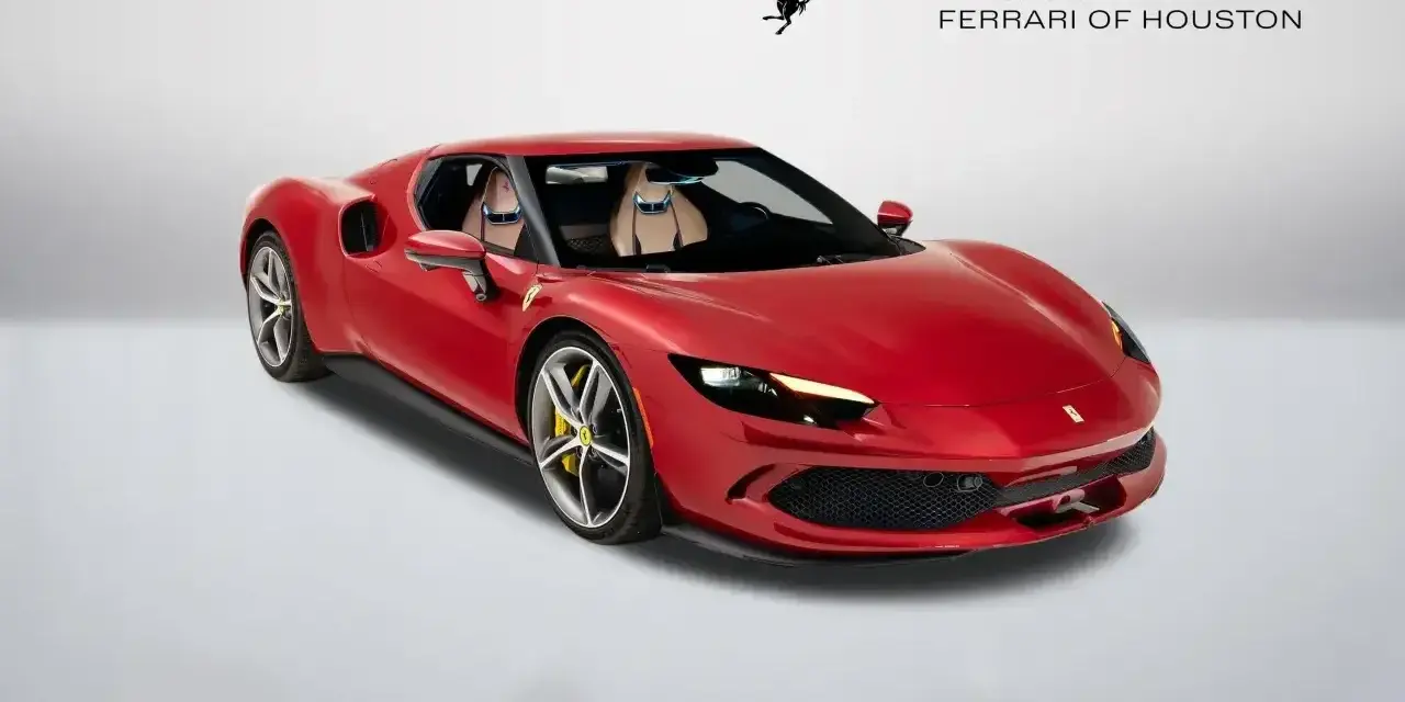 Czerwone Ferrari 296 GTB z beżowym wnętrzem, zaparkowane na białym tle. Obok logo Ferrari i napis "Official Ferrari Dealer Ferrari of Houston".