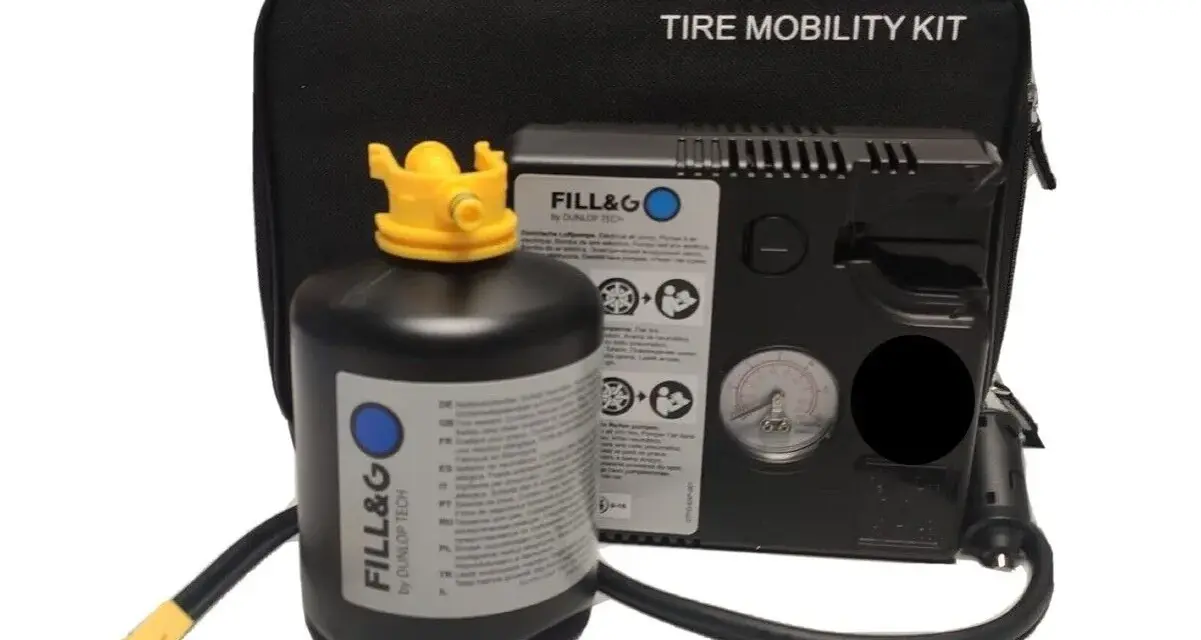 Kit di riparazione pneumatici: una bombola sigillante e un compressore per gonfiare e riparare la gomma in caso di emergenza.