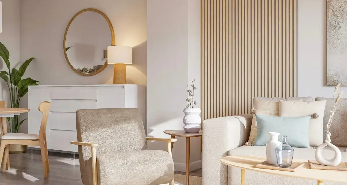 Salón acogedor con sofá y sillón en tonos tierra, mesa de centro de madera y detalles decorativos en colores neutros.