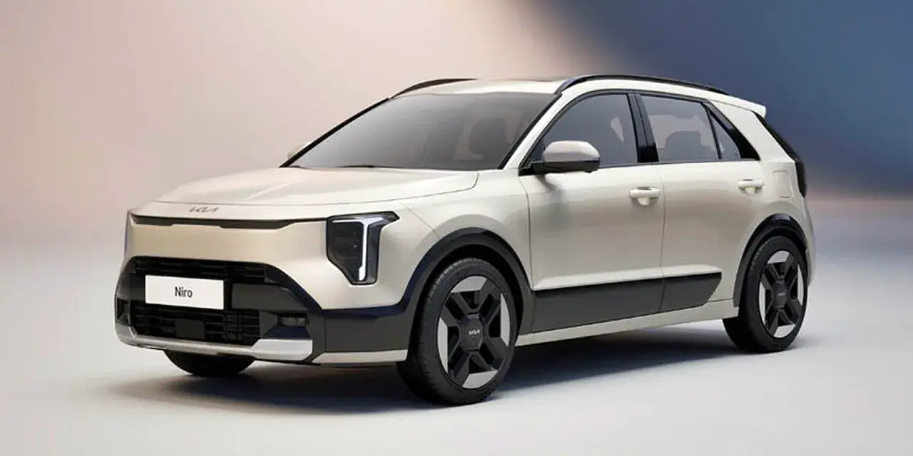 Biały Kia Niro EV z nowoczesnymi światłami i czarnymi akcentami, gotowy na ekologiczną podróż.