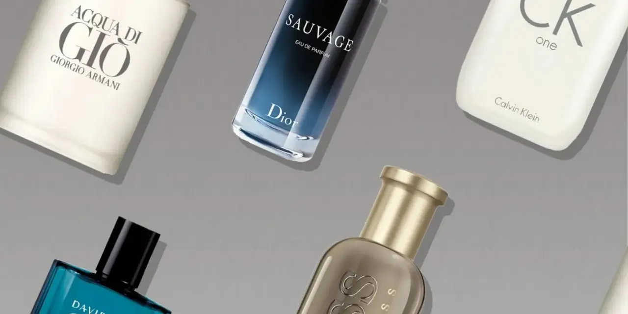 Fünf Flakons mit Herrendüften: Acqua di Gio, Sauvage, CK One, Cool Water, Boss.