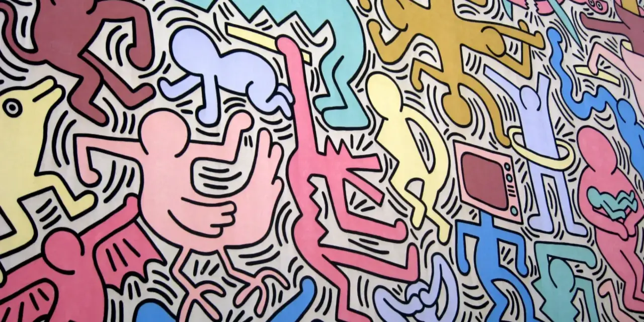 Une fresque colorée de Keith Haring, œuvre la plus connue, avec des figures stylisées dansant et interagissant, un chien jaune, un bébé et une télévision.