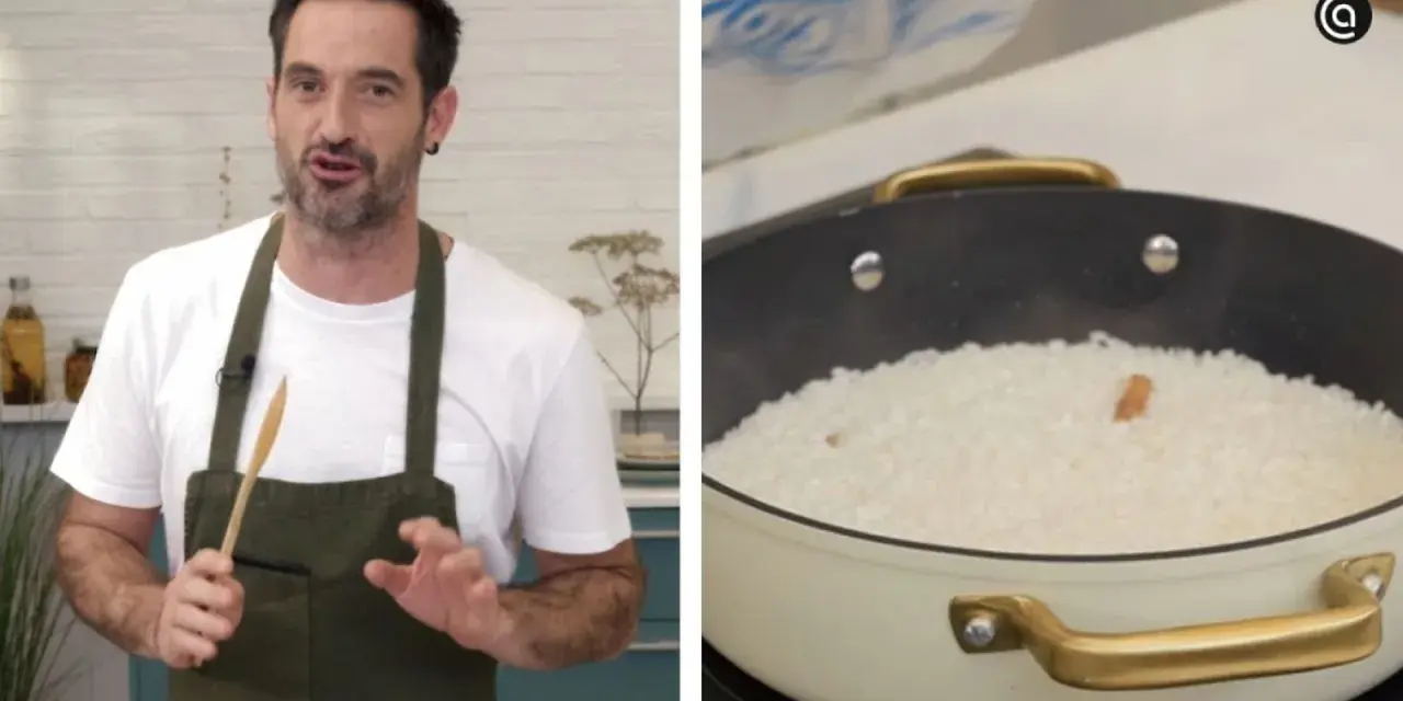 Chef explica cómo preparar una deliciosa paella al horno. Arroz blanco en una sartén, listo para cocinar.