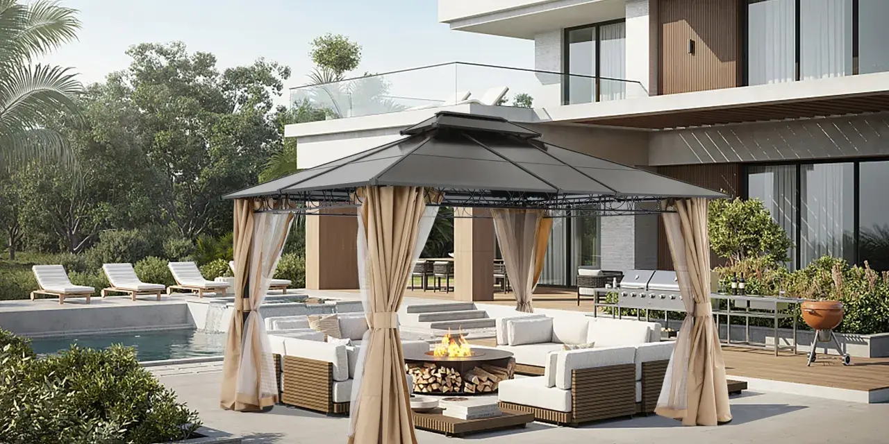 A modern gazebo with curtains creates a cozy outdoor living space. This image shows how to build a gazebo for entertaining, complete with a fire pit and lounge area.