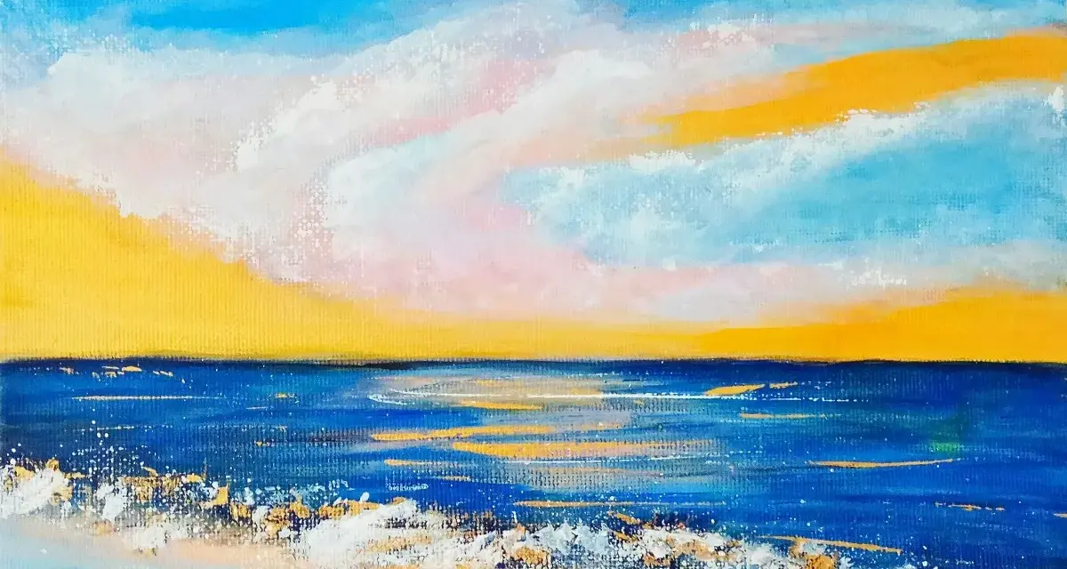 En solnedgång över havet med vågor som slår mot stranden. En vacker inspiration för saker att måla.