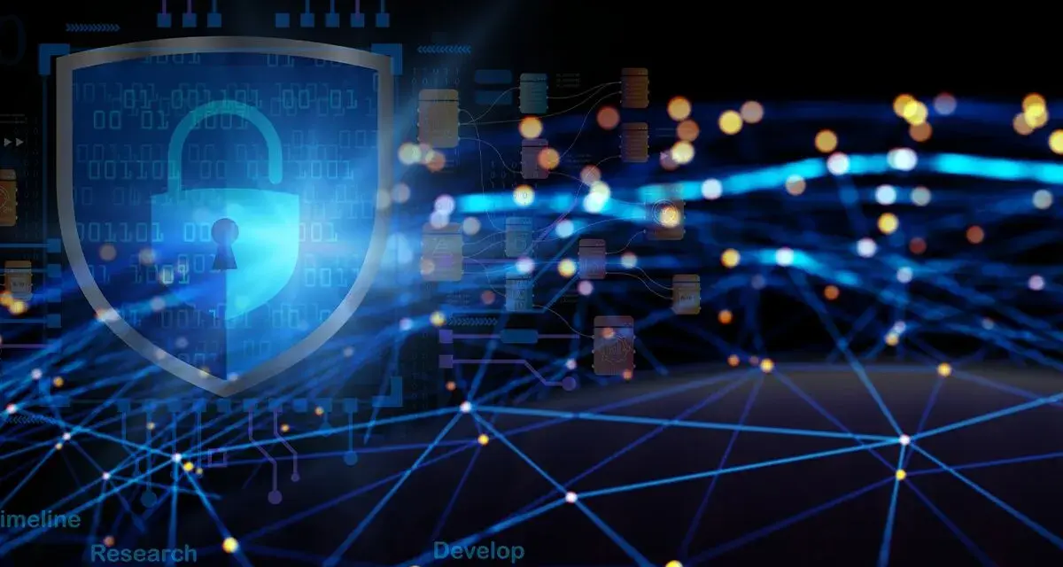 Cybertarcza chroni przed cyberzagrożeniami. W tle sieć połączeń i dane cyfrowe.