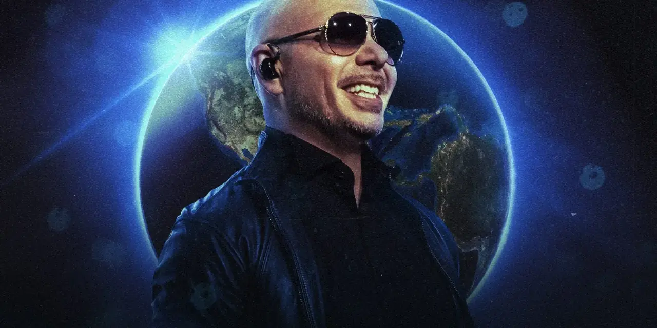 Pitbull w okularach przeciwsłonecznych uśmiecha się na tle Ziemi. To zapowiedź jego światowego koncertu.
